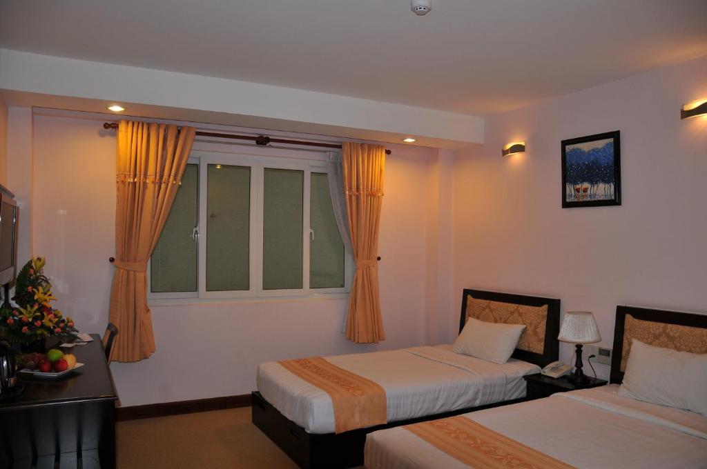 Dong Kinh A Hotel Ho Chi Minh-stad Kamer foto